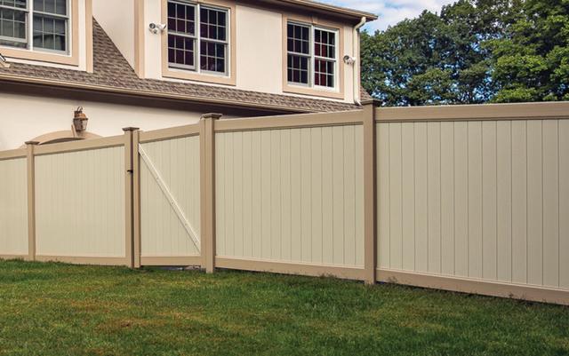 beige residential vinyl fence