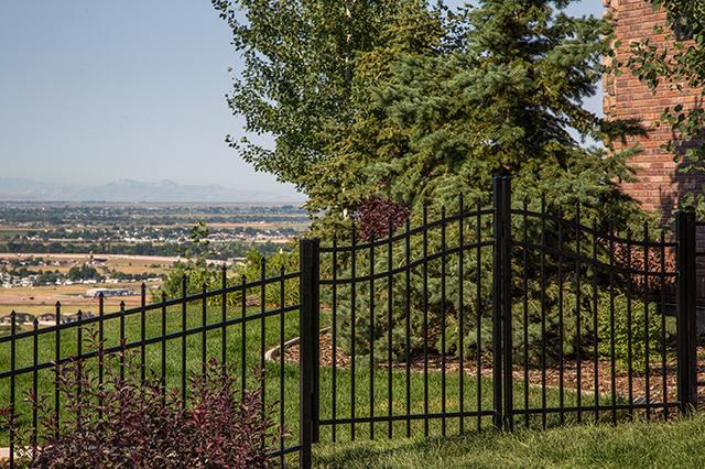 black aluminum fence with double gate