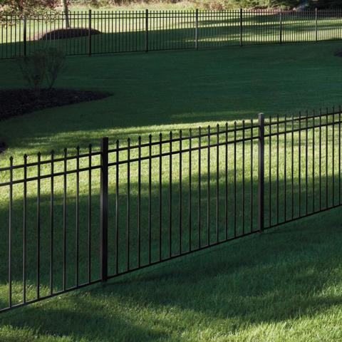 black aluminum fence in large yard