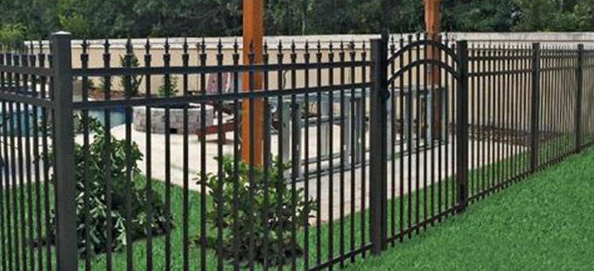 black aluminum fence in backyard